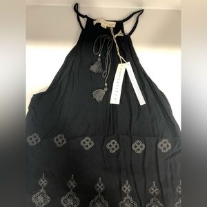 Lovestitch black medium tank with tags. Never been worn. Smoke free home.